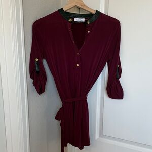 Calvin Klein Burgundy Tunic with Black Leather and Gold Details 🍷